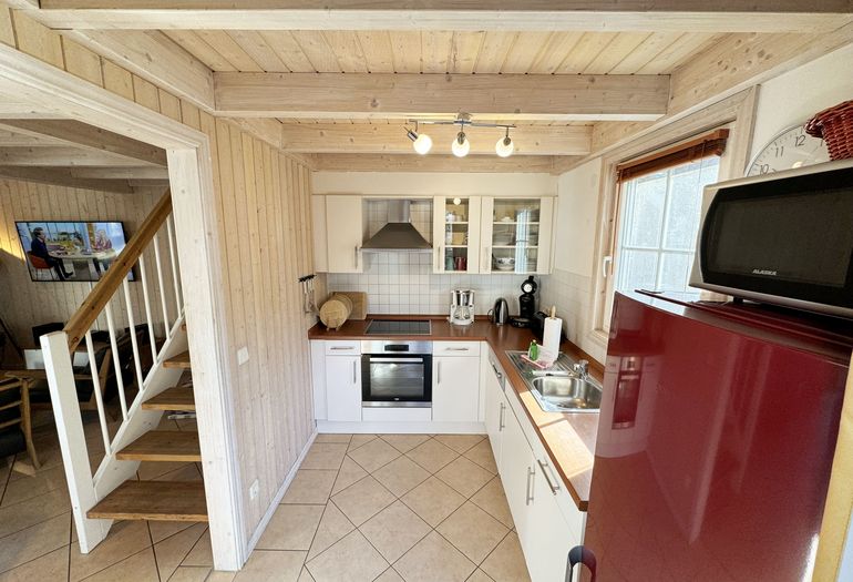 Ferienhaus Sprottenkiste - Blick auf Küche und Wohnzimmer