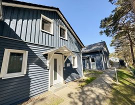 Ferienhaus Blaue Welle mit Terrasse