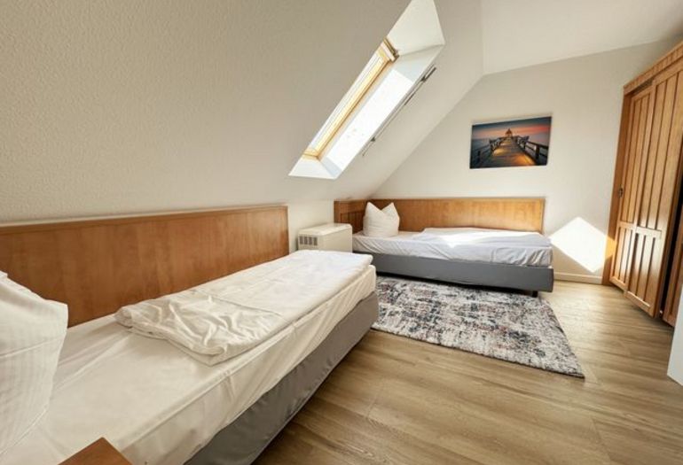 2. Schlafzimmer mit Einzelbetten der Ferienwohnung